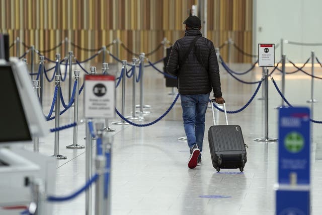 Passenger numbers at UK airports last year were 78% below pre-pandemic levels, new figures show (Steve Parsons/PA)