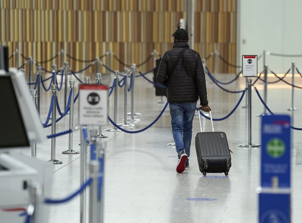 Passenger numbers at UK airports last year were 78% below pre-pandemic levels, new figures show (Steve Parsons/PA)