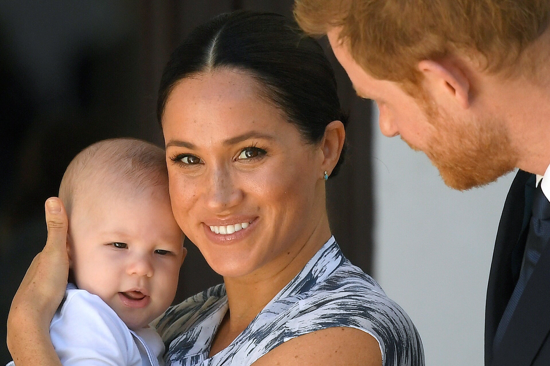 The Duke and Duchess of Sussex hold their son Archie during a visit to Africa (Toby Melville/PA)