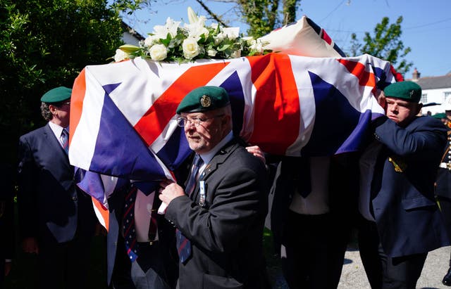 The coffin of 96-year-old Harry Billinge is carried into St Paul’s Church in Charlestown, Cornwall (Ben Birchall/PA)