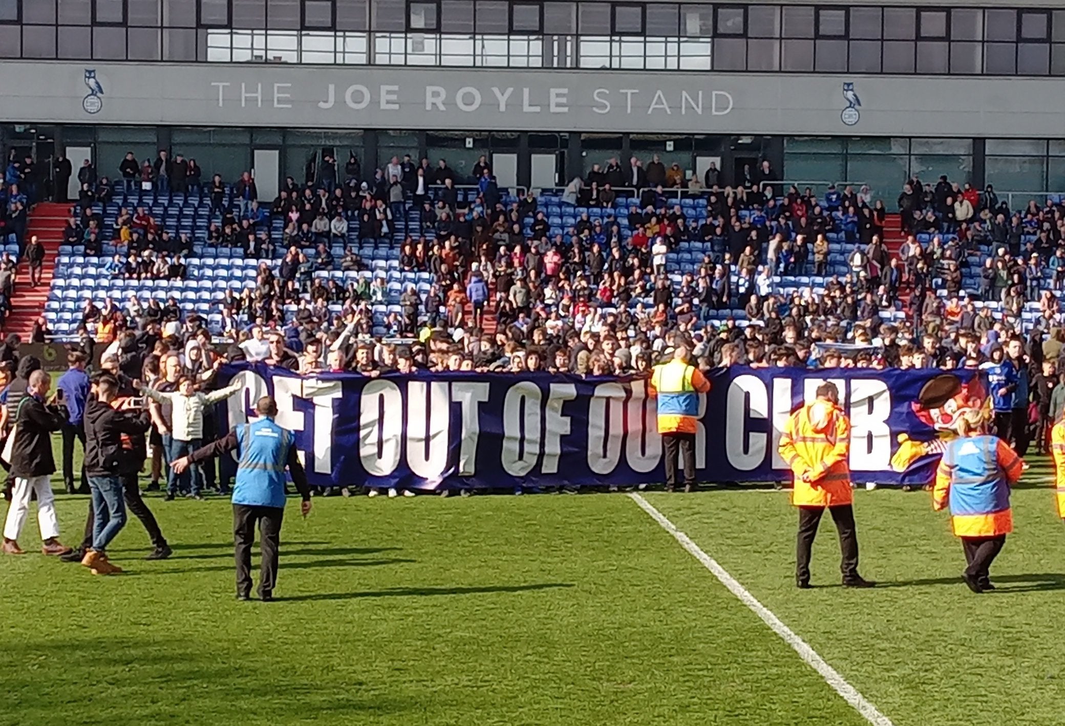 Protesting fans stormed the pitch as Oldham were losing to Salford before dropping out of the Football League (Lee Morris/PA)