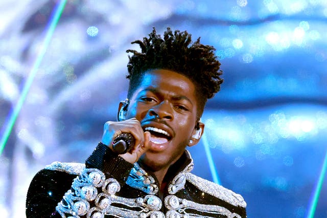 <p>Lil Nas X performs onstage during the 64th Annual Grammy Awards</p>