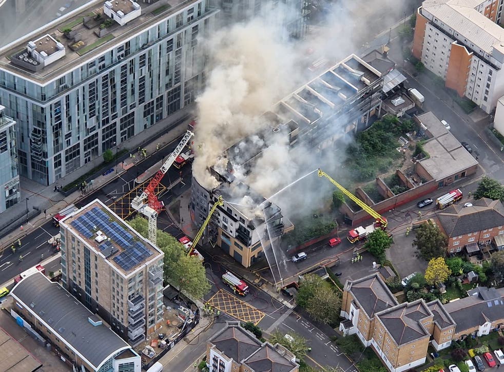 Smoke rising from the block of flats, pictured from a police helicopter on the scene (NPAS London/PA)