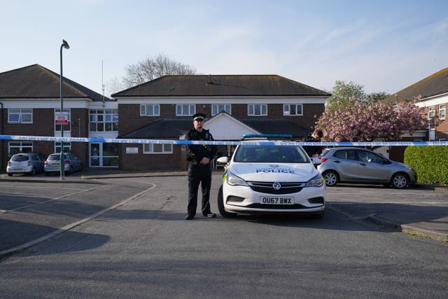 Police officers outside Orchard House in Spring Gardens, Bourne End (Jonathan Brady/PA)