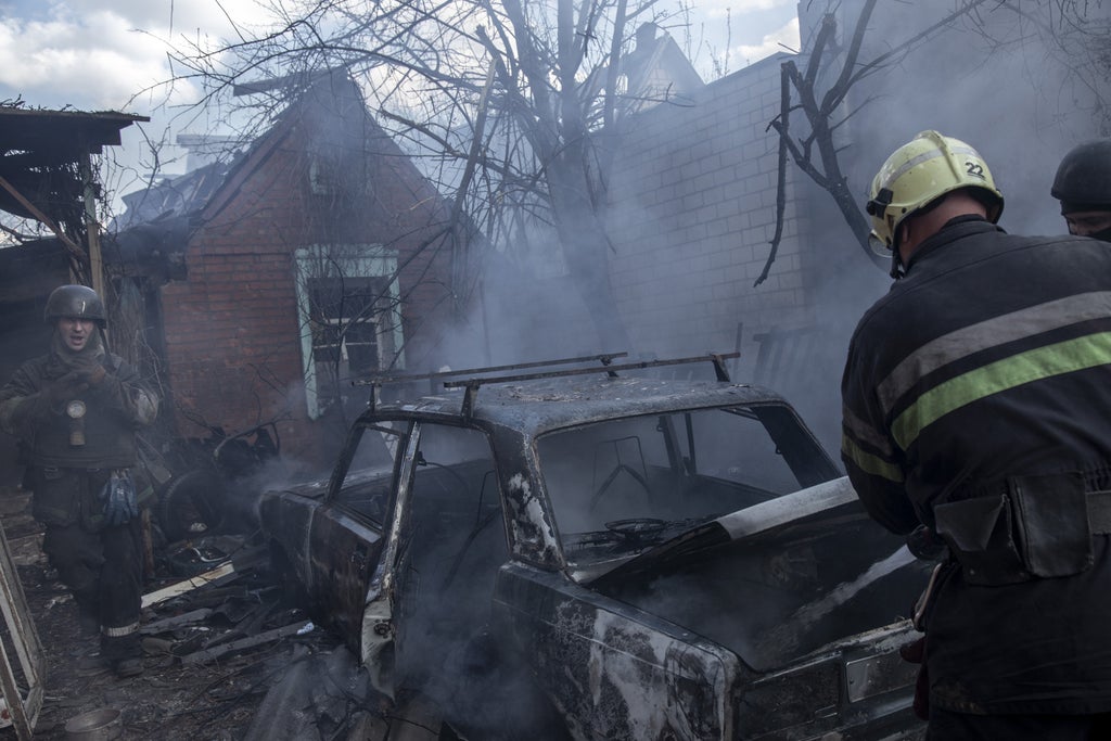 Ukraine news – live: Russian weapons depot on fire after explosions heard in Belgorod