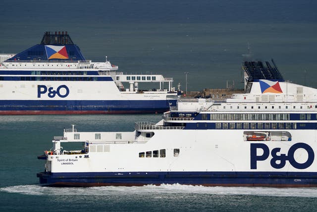 <p>The P&O Ferries vessel Spirit of Britain (bottom) arrives back at the Port of Dover in Kent</p>