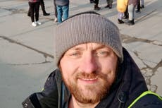 Ukrainian man with van evacuates 200 from Mariupol in battered red vehicle