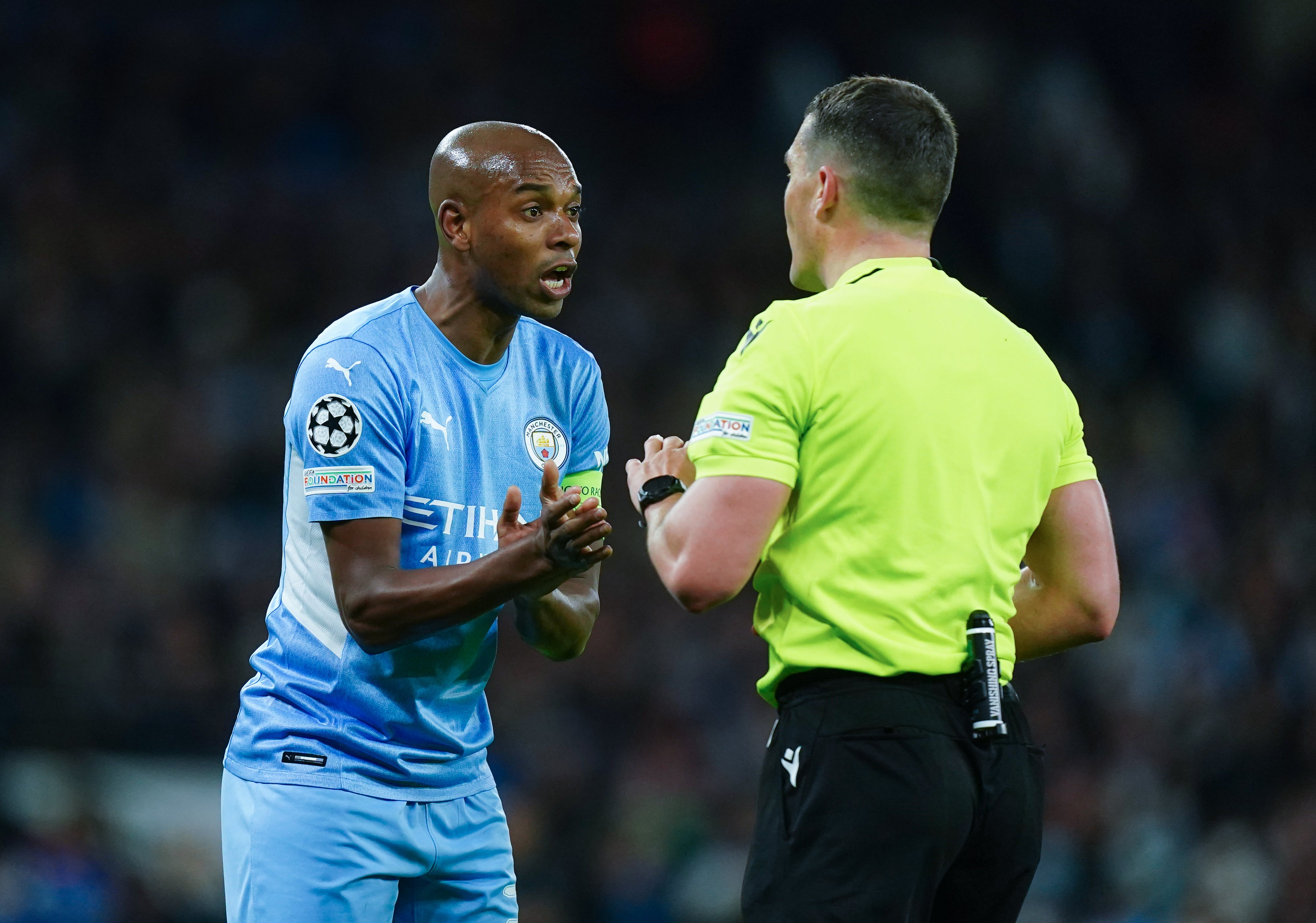 Manchester City’s Fernandinho speak to Referee Istvan Kovacs during the UEFA Champions League Semi Final, First Leg, at the Etihad Stadium, Manchester. Picture date: Tuesday April 26, 2022.