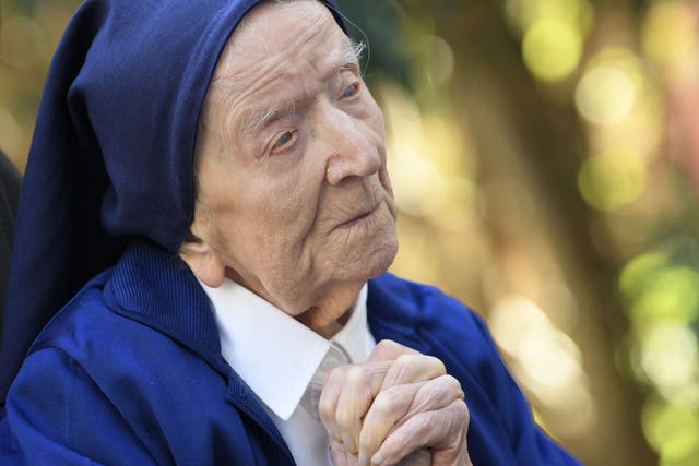 <p>Sister Andre, Lucile Randon in the registry of birth, the eldest French and European citizen, prays in a wheelchair, on the eve of her 117th birthday </p>