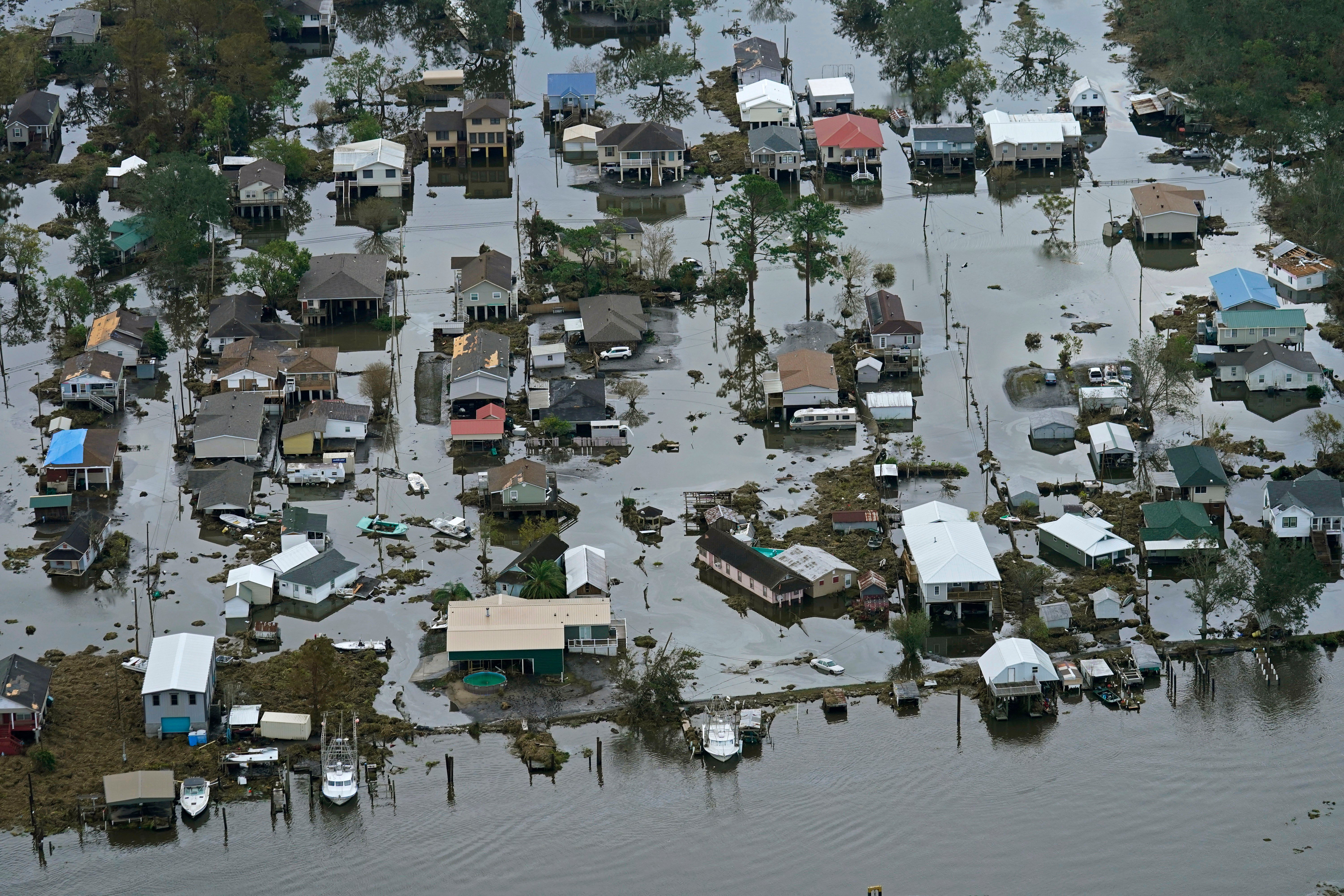 Floodwaters slowly recede in the aftermath of Hurricane Ida in Lafitte, La., about 25 miles south of New Orleans, Wednesday, September 1, 2021