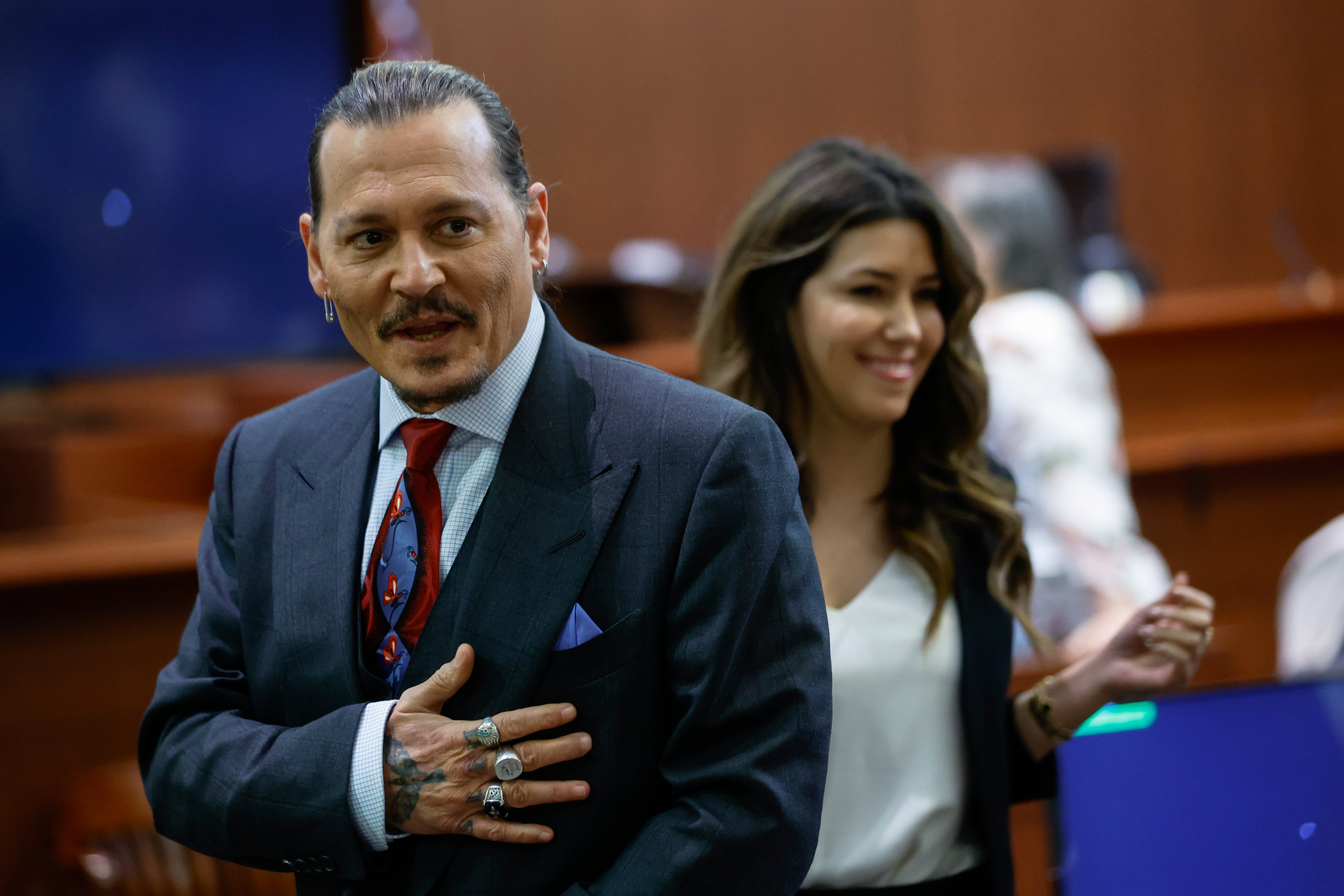 Actor Johnny Depp stands in the courtroom during a recess amid the Depp v Heard defamation trial at the Fairfax County Circuit Courthouse in Fairfax, Virginia, USA, 27 April 2022