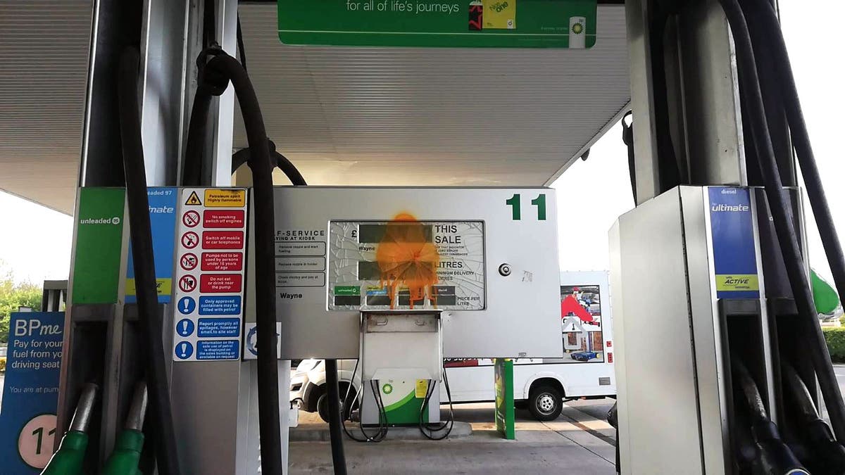 Climate protesters smash petrol pumps at motorway services