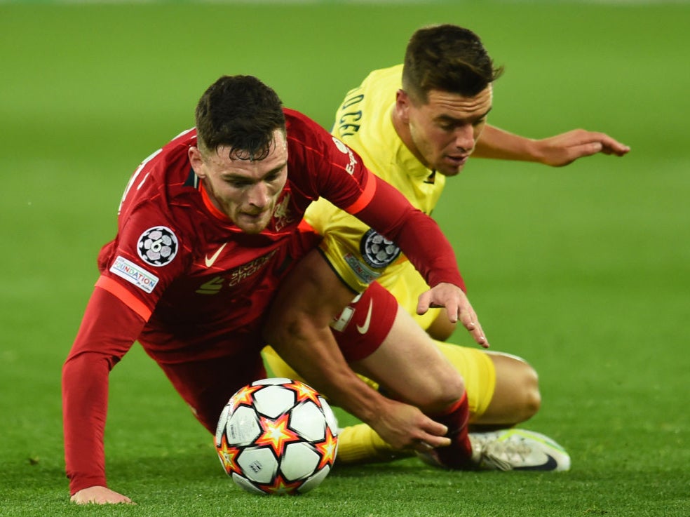 Andrew Robertson is brought down by Giovani Lo Celso