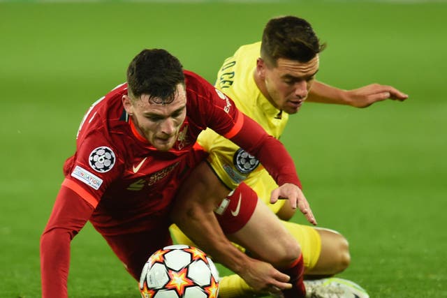 <p>Andrew Robertson is brought down by Giovani Lo Celso</p>