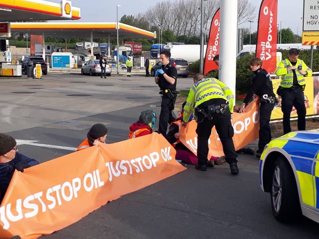 <p>Police at Cobham Services (Just Stop Oil/PA)</p>
