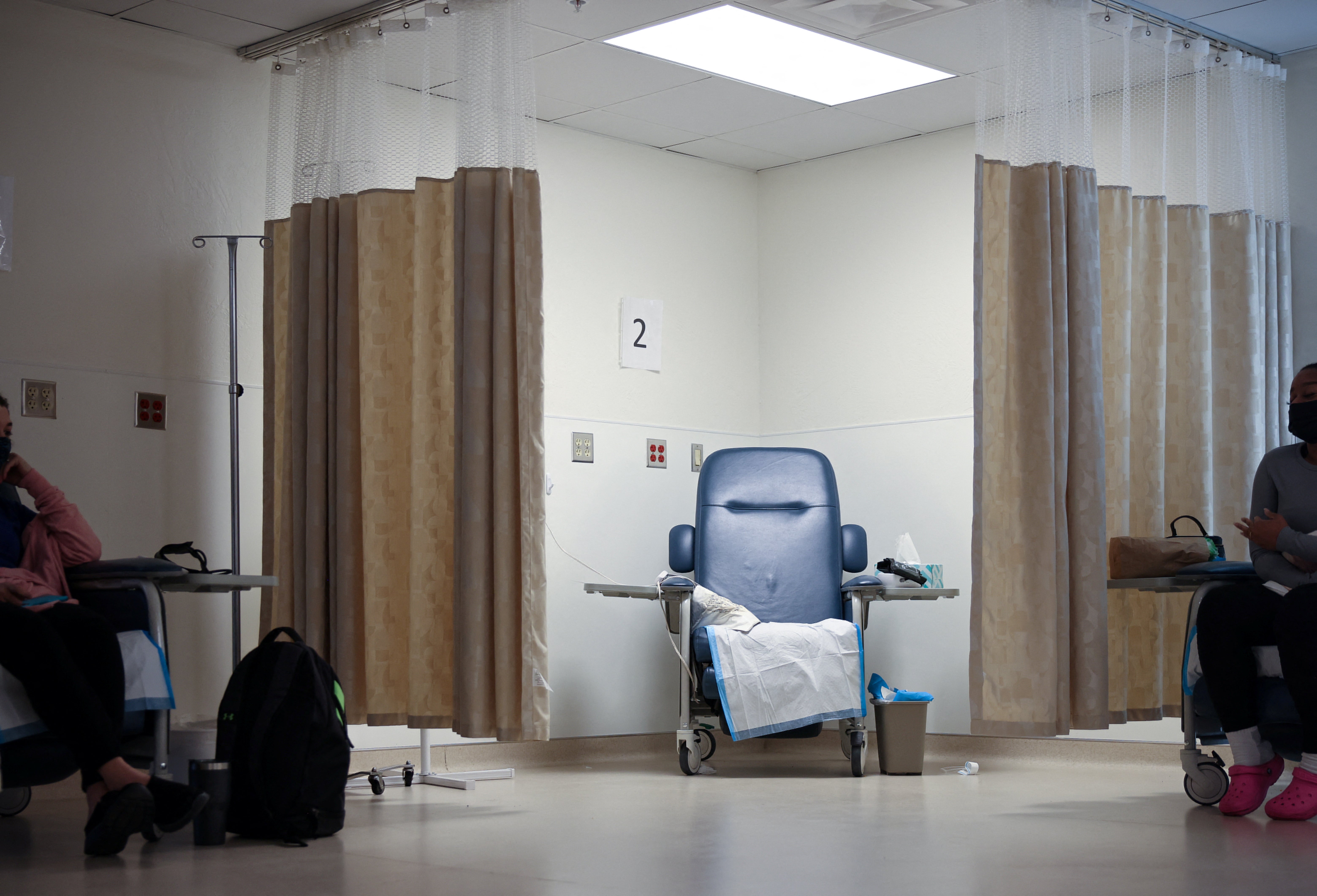 Two women from Texas talk to each other about their travel to Oklahoma as they wait in the recovery room following their abortions at the Trust Women clinic