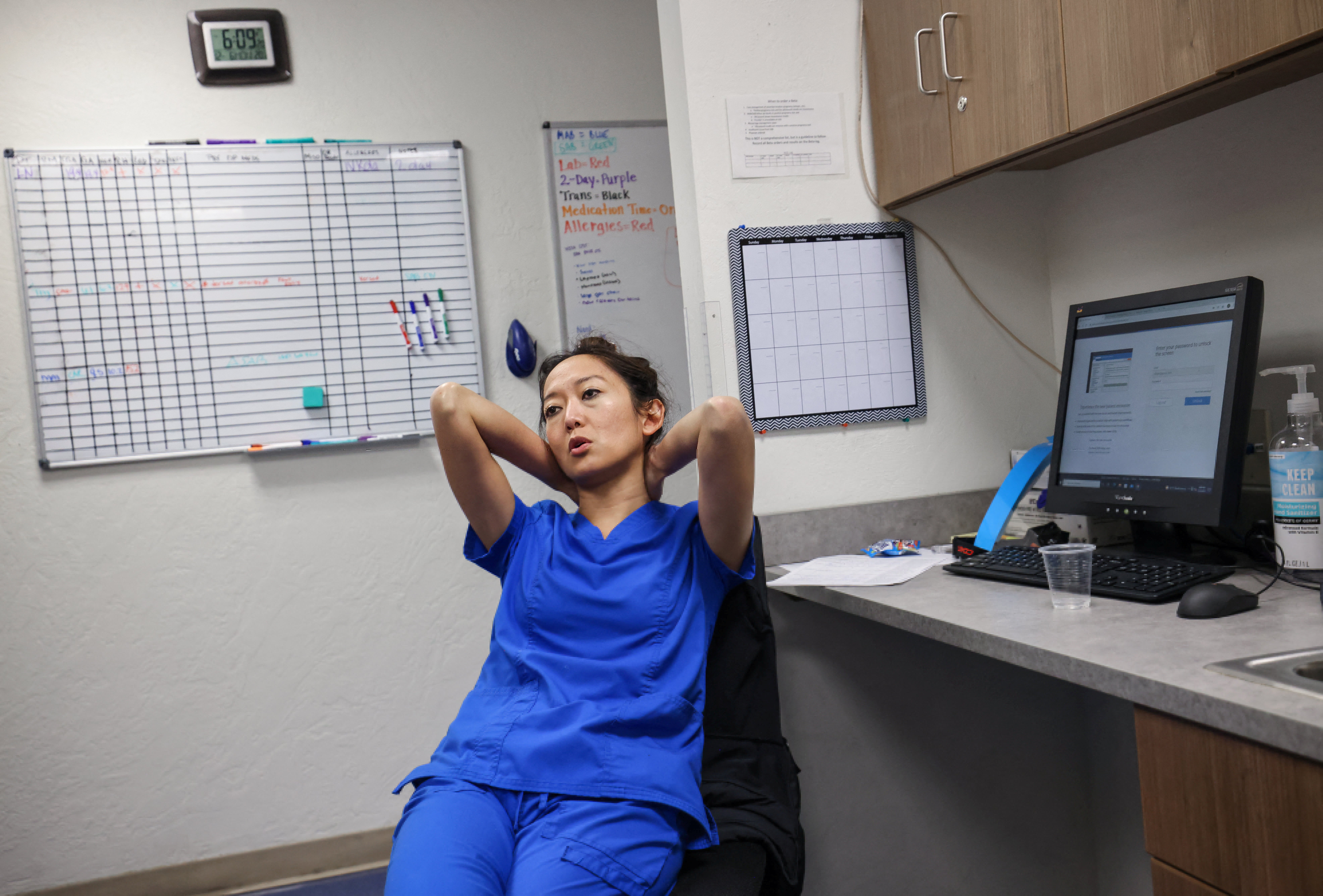 Tien sits at her desk after finishing the last abortion of the day at the Trust Women clinic in Oklahoma City