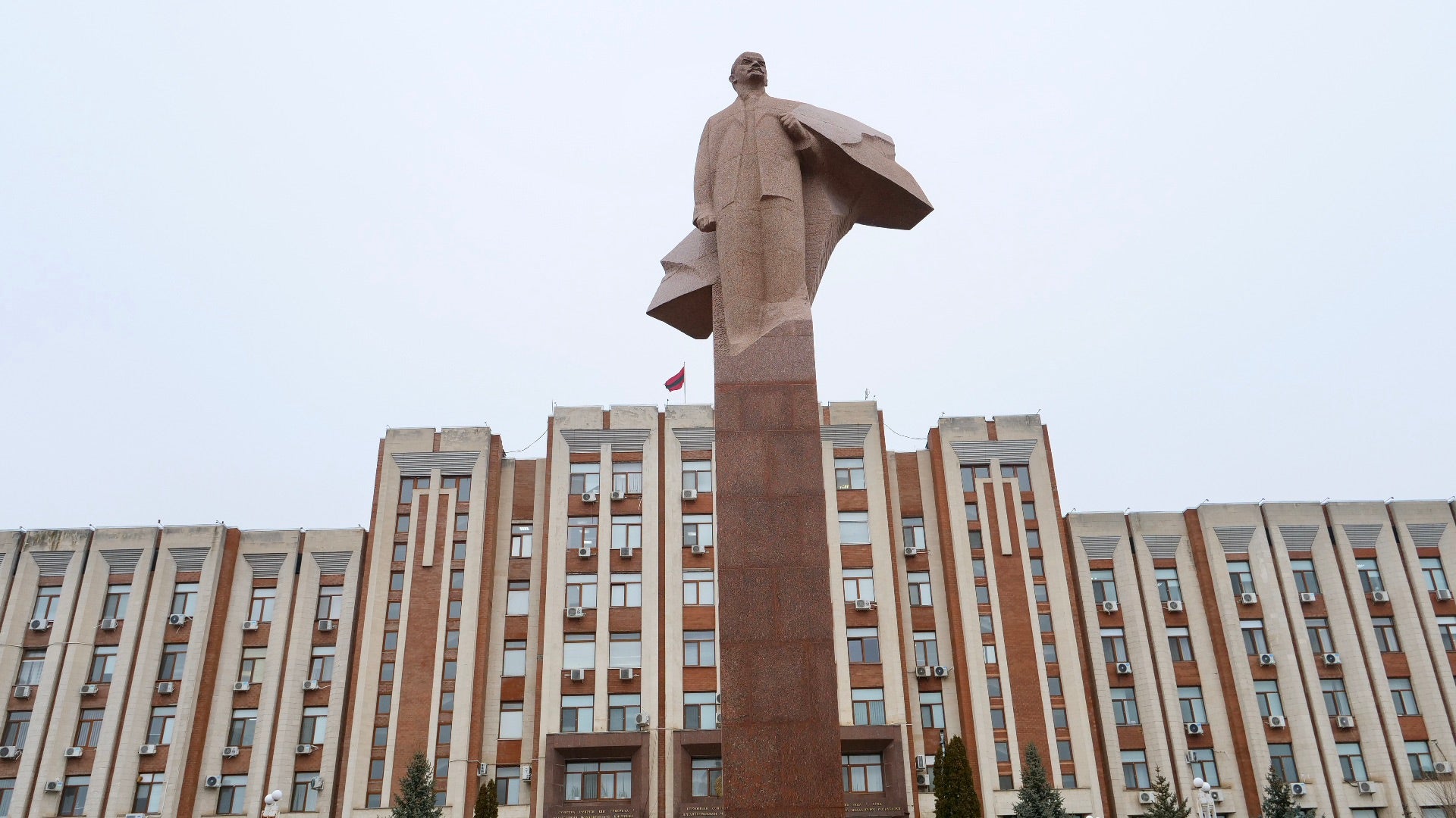 A statue of Vladimir Lenin seen outside a government office in Tiraspol