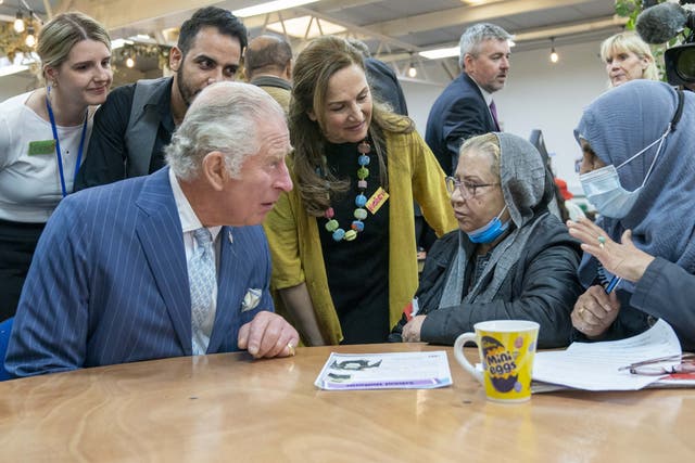 The Prince of Wales meets with beneficiaries, staff and volunteers at the West London Welcome centre (Arthur Edwards/The Sun/PA)