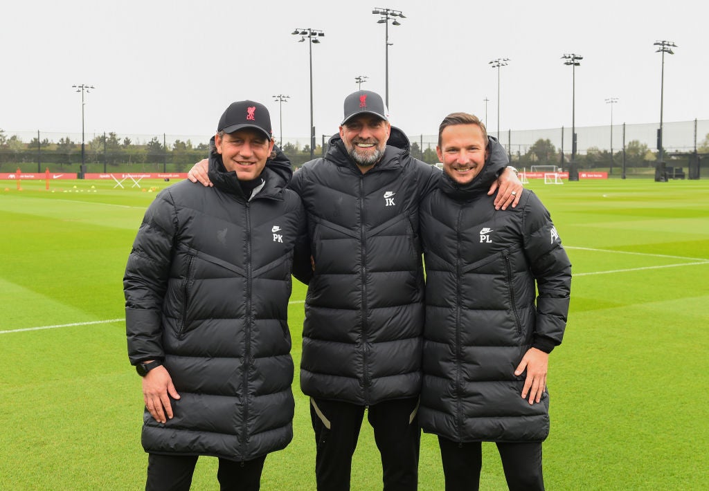 Klopp with Krawietz (left) and Lijnders after signing contract extensions