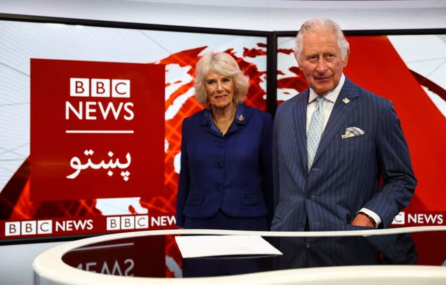 The Prince of Wales and the Duchess of Cornwall in a TV studio during a visit to the BBC World Service at BBC Broadcasting House, London, to mark it's 90th year and to thank staff and learn how they are continuing their operations across Ukraine, Russia and Afghanistan