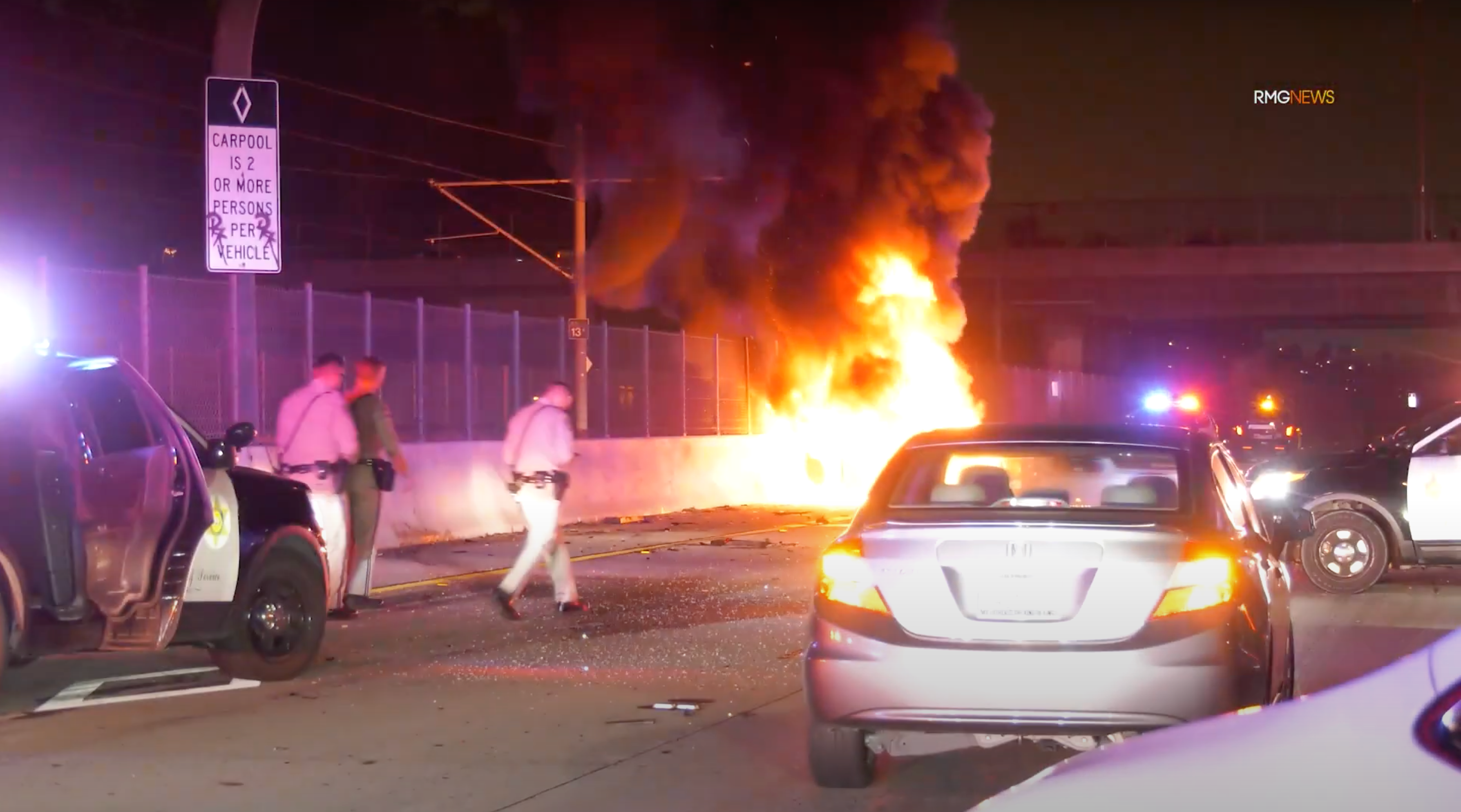 A California Highway Patrol vehicle caught fire after an out-of-control driver crashed into it, witnesses say