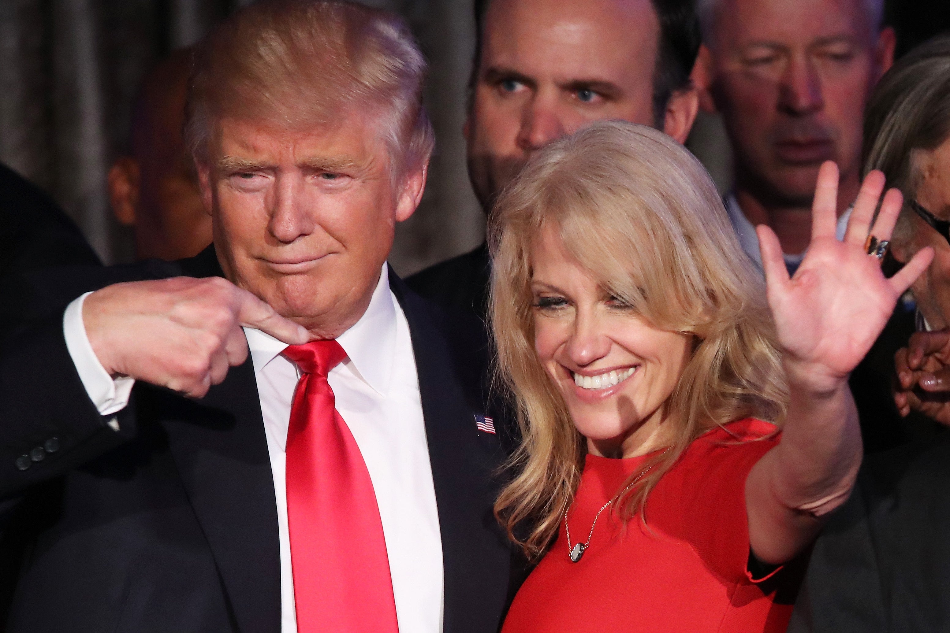 Republican president-elect Donald Trump along with his campaign manager Kellyanne Conway acknowledge the crowd during his election night event at the New York Hilton Midtown in the early morning hours of November 9, 2016 in New York City
