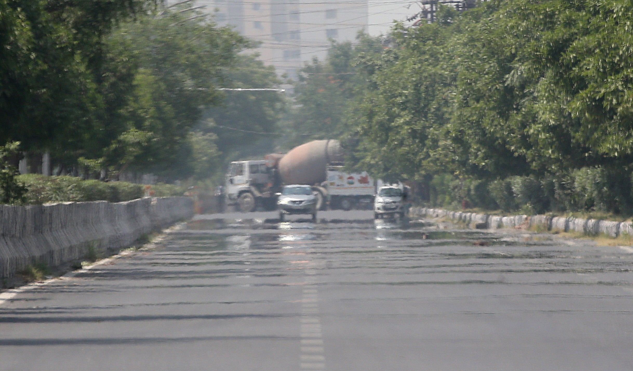 A view of heat haze occurring on the surface of a road near New Delhi, India, 28 April 2022