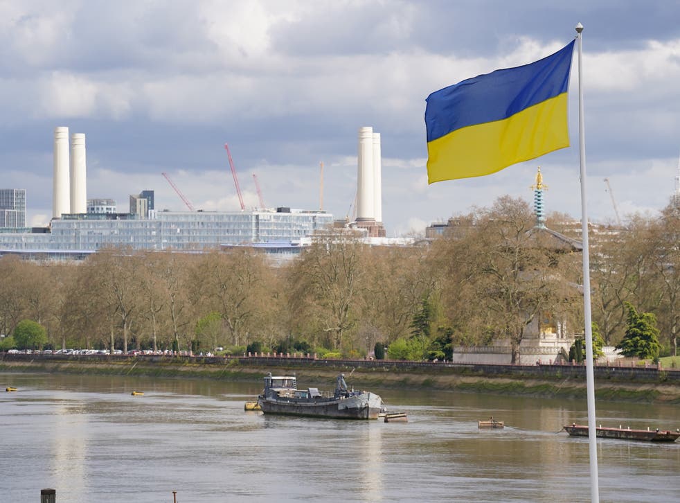 A Ukrainian flag flying on Cadogan Pier by the River Thames in London. (PA Wire)