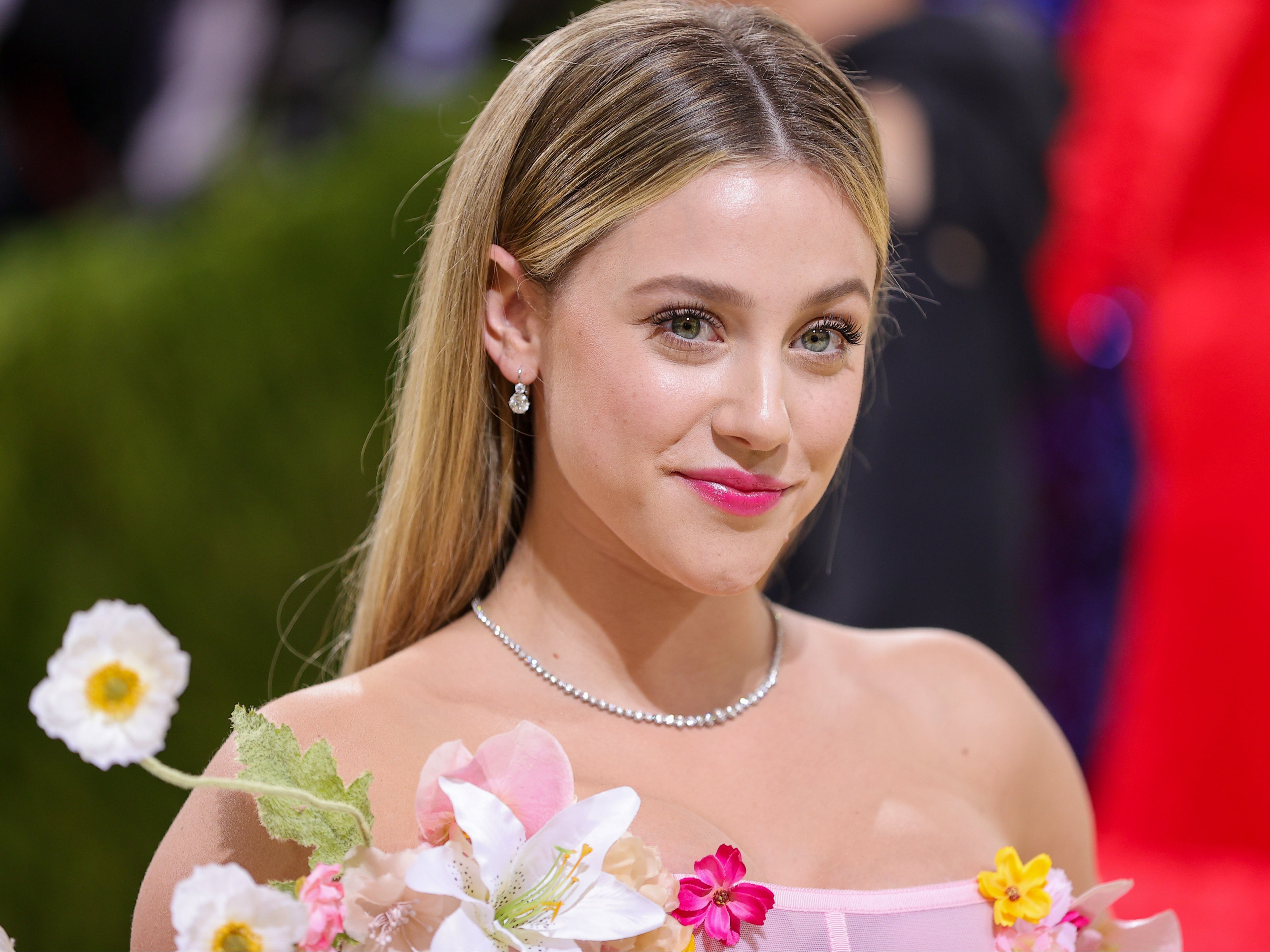Lili Reinhart reveals she meets with a ‘channeler’ weekly