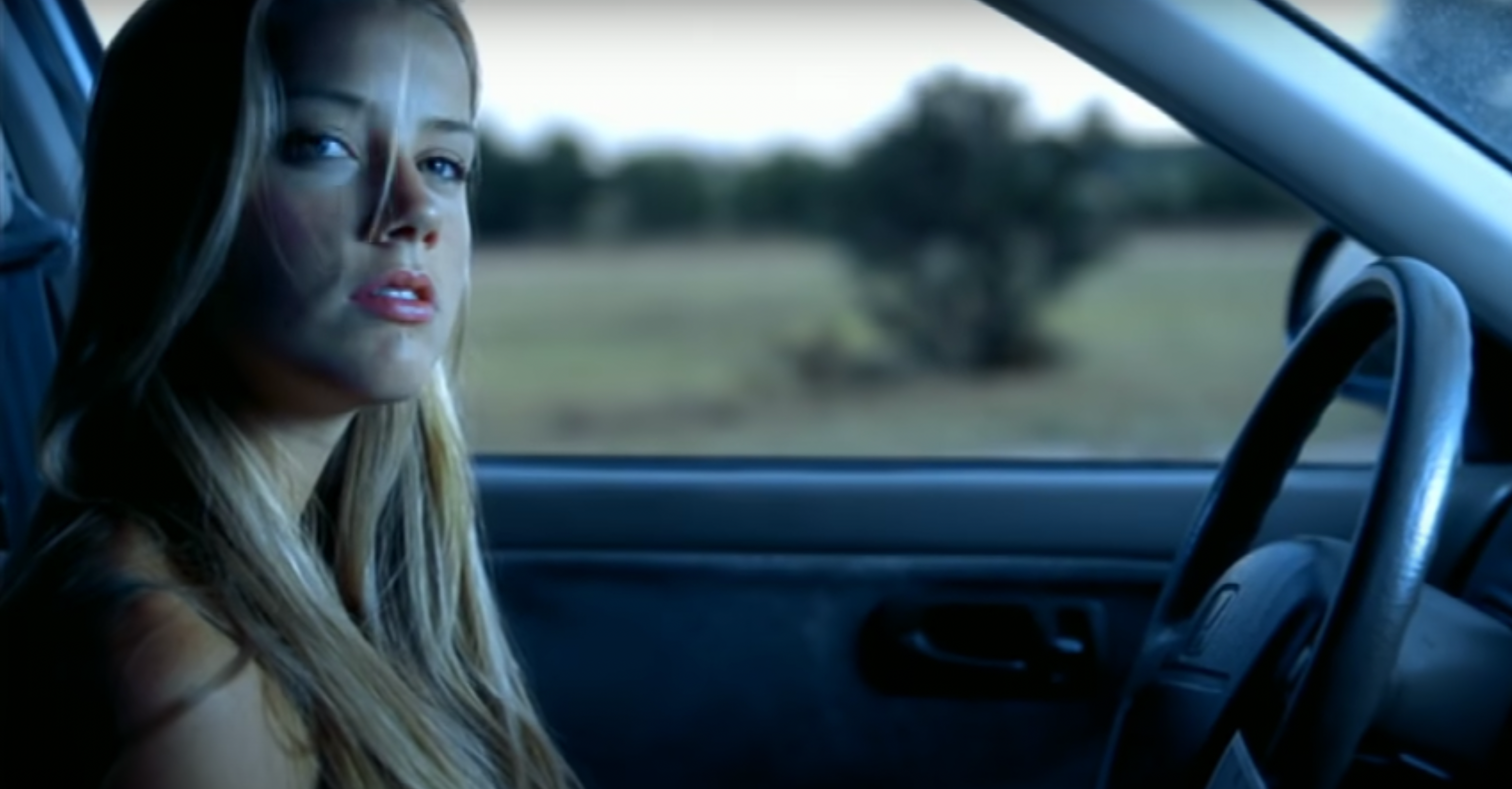 Amber Heard in Kenny Chesney’s “There Goes My Life”