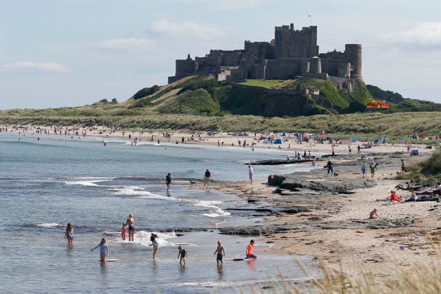 <p>A view of Bamburgh Castle and the beach </p>