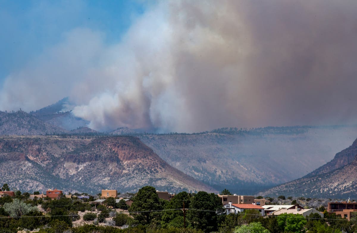 Firefighters battling New Mexico blaze brace for wind Firefighters battling New Mexico blaze brace for wind