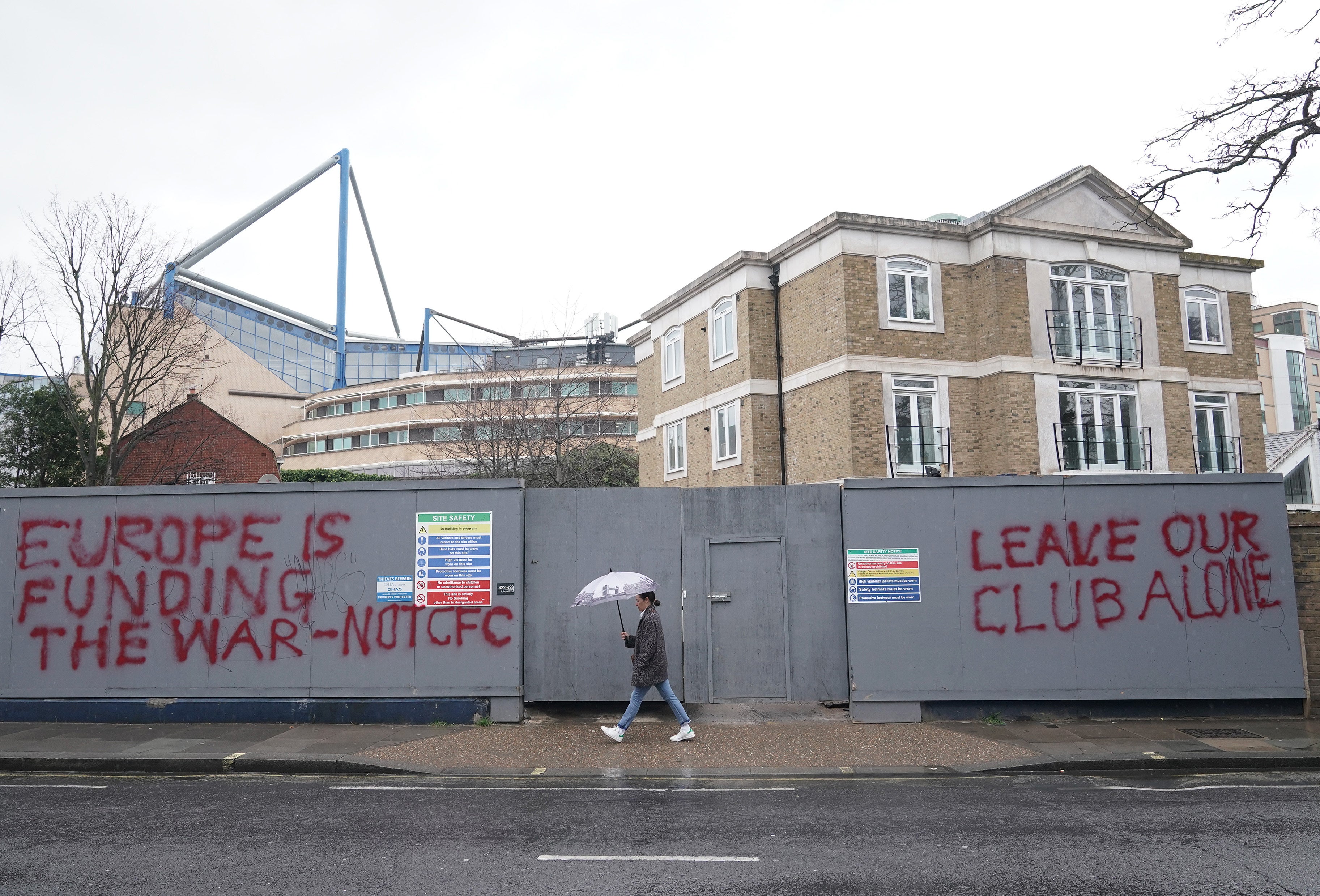 Graffiti close to Stamford Bridge shows the strength of feeling around Chelsea’s sale after owner Roman Abramovich was sanctioned by the UK Government (Yui Mok/PA)