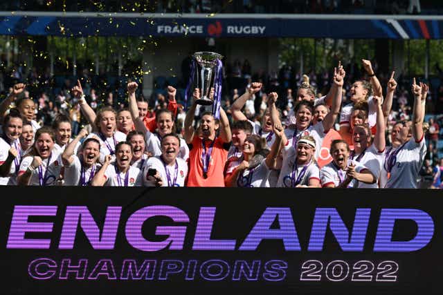 <p>England players lift the trophy in Bayonne </p>