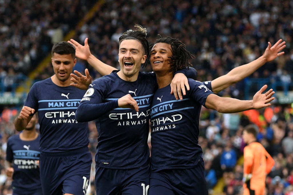Manchester City hit four to see off spirited Leeds and maintain edge in title race