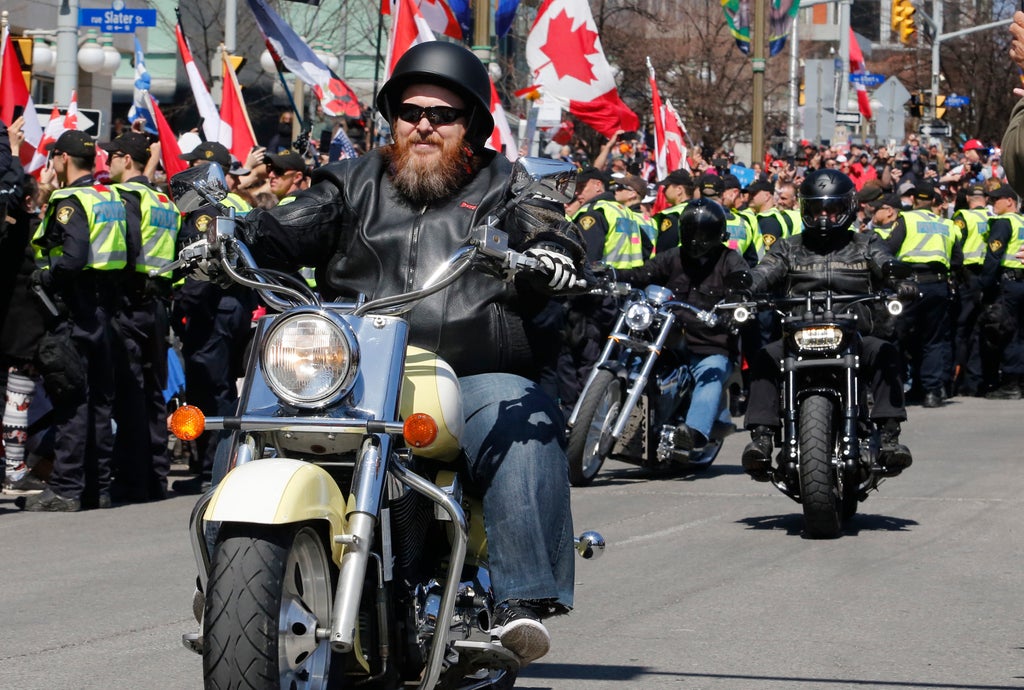 Motorcycles rumble through Canadian capital under police eye