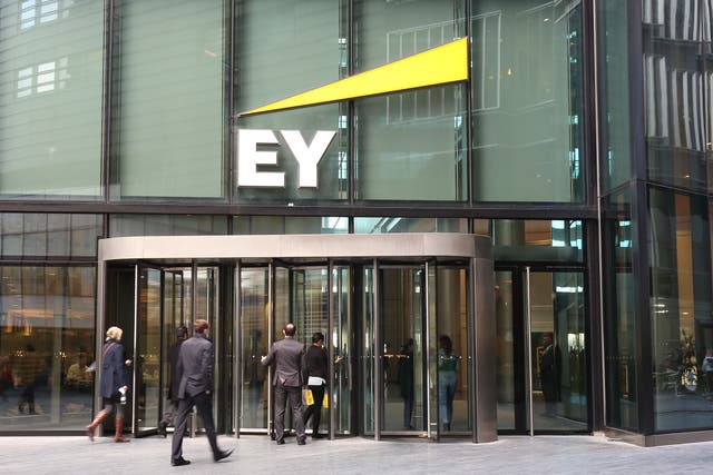 A report by EY said that profit warnings among UK-listed firms surged in the latest quarter (Philip Toscano/PA)