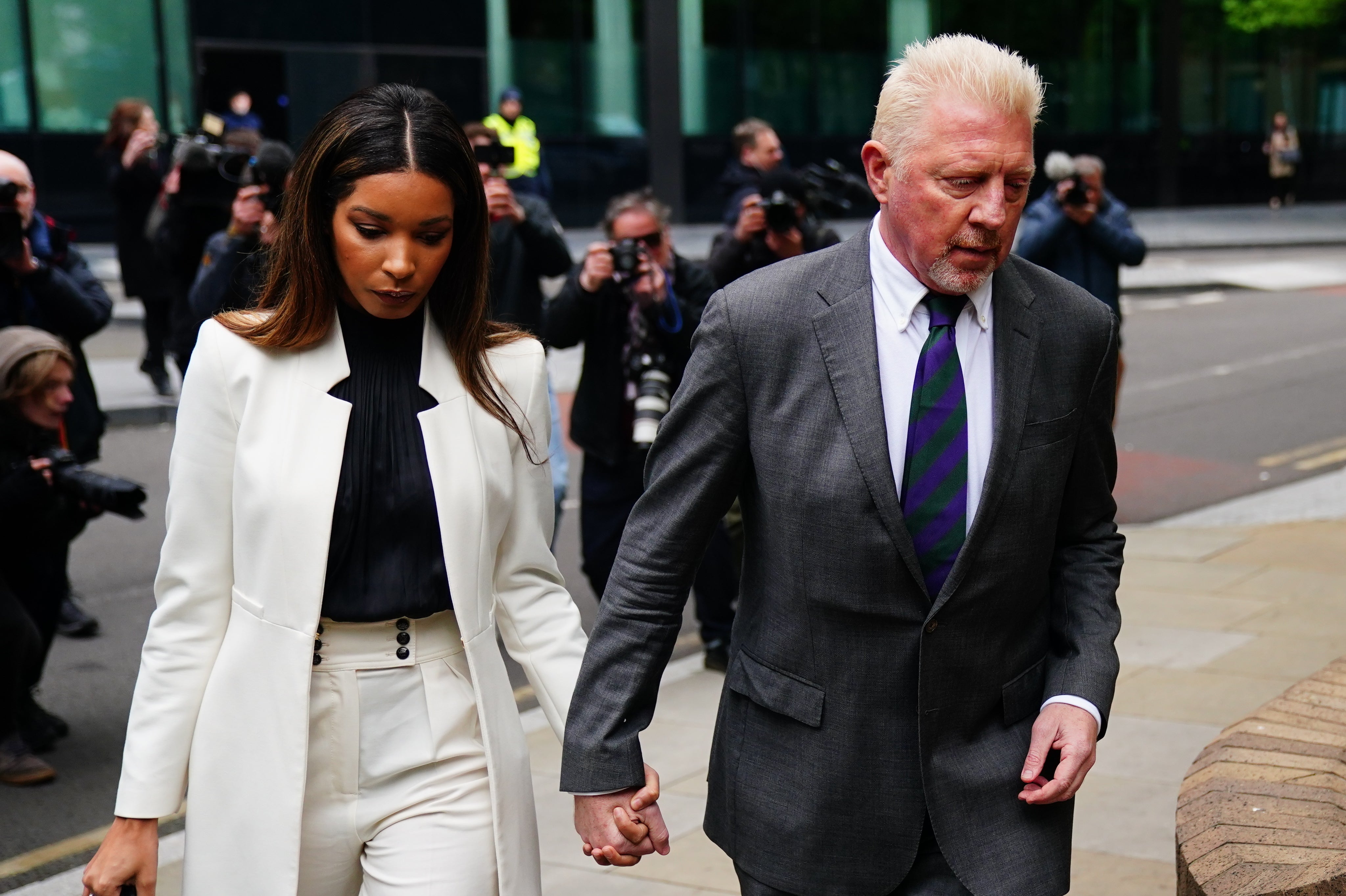 Three-time Wimbledon champion Boris Becker arrives at Southwark Crown Court with his partner, Lilian de Carvalho Monteiro, ahead of sentencing (Victoria Jones/PA)