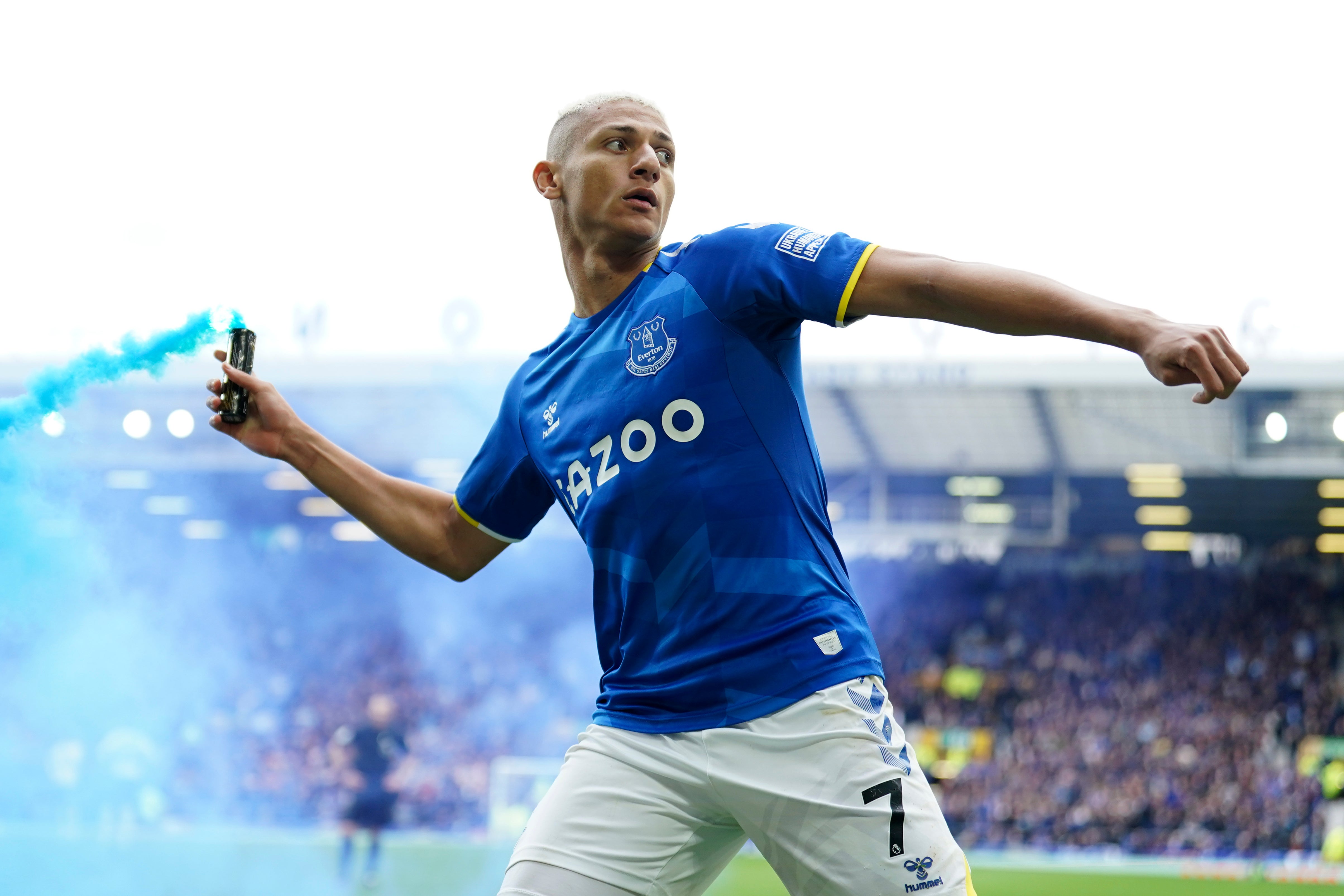 Everton striker Richarlison throws a flare after scoring his side’s winner against Chelsea at Goodison Park (Jon Super/PA)