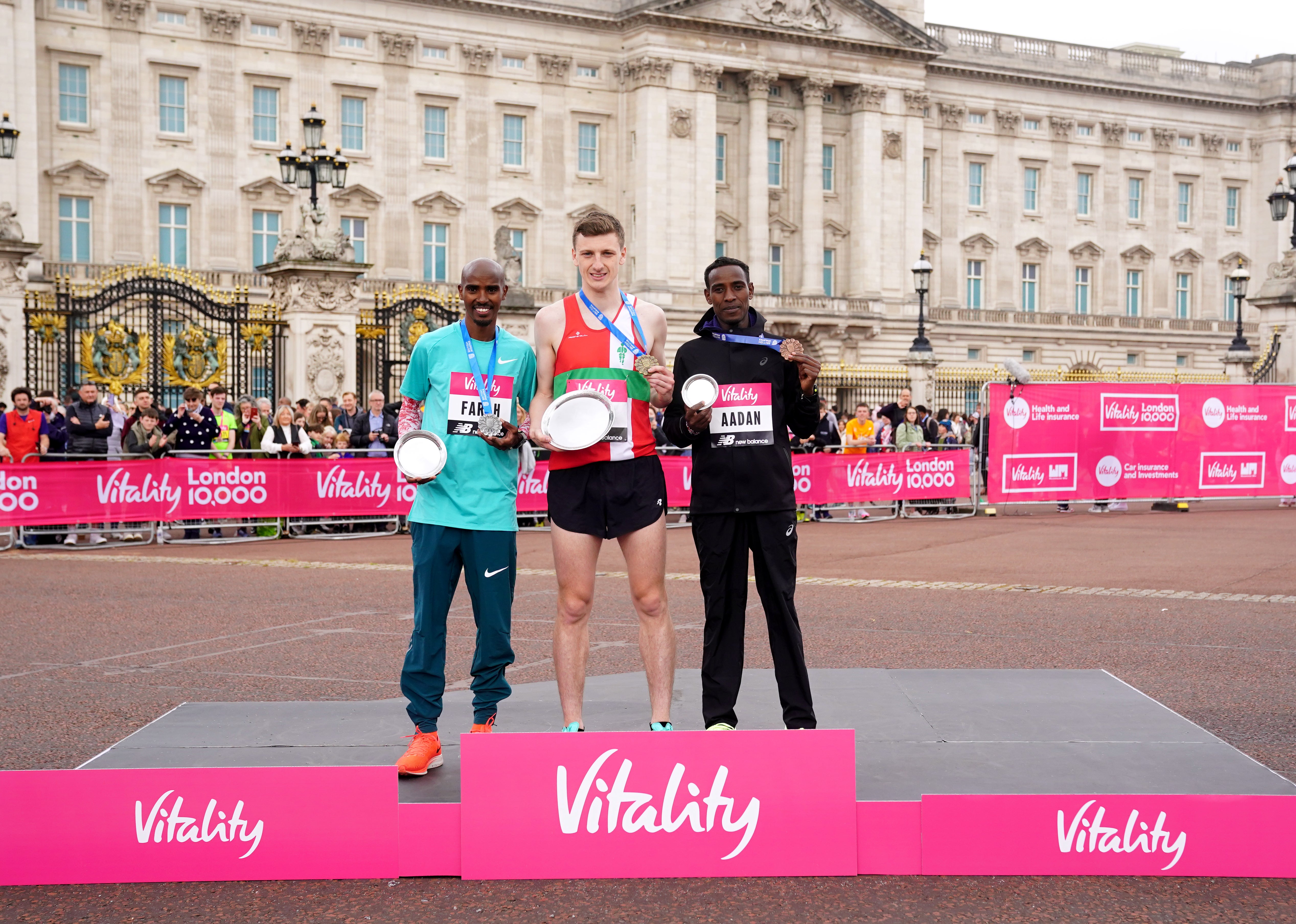 Sir Mo Farah (left) was second behind Ellis Cross (centre) at the Vitality London 10,000 (Adam Davy/PA)