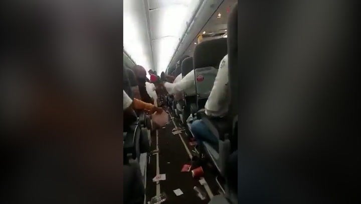 <p>Video shows mid-air panic inside plane as flight hits turbulence during descent</p>