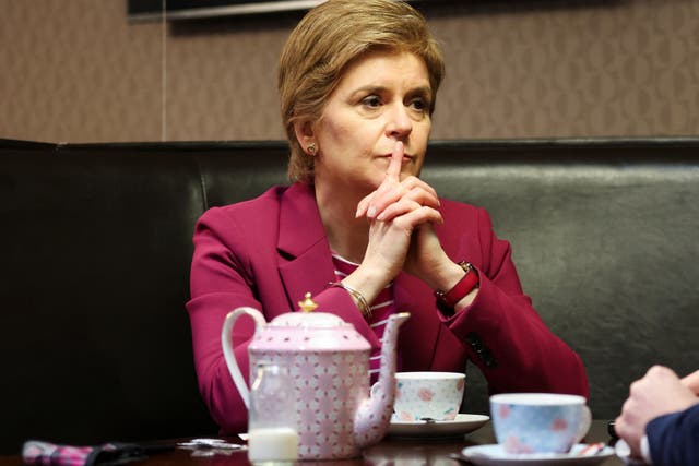 First Minister of Scotland Nicola Sturgeon takes tea at a cafe in Arbroath (Russell Cheyne/PA)