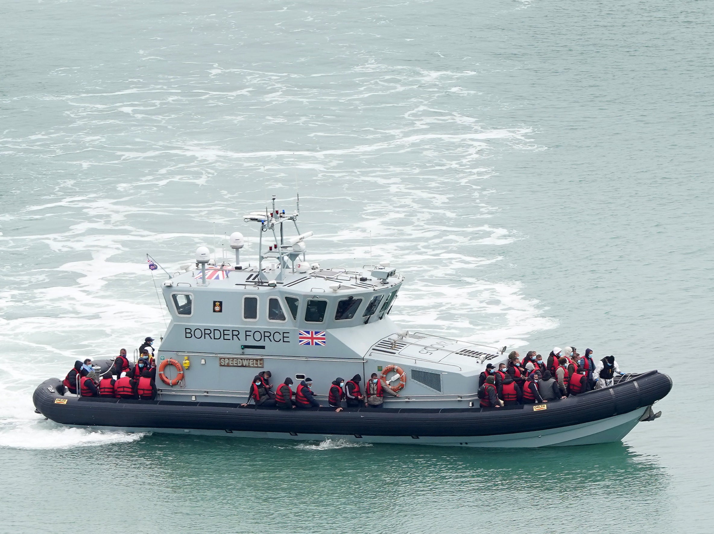 A group of people thought to be migrants are brought in to Dover, Kent, onboard a Border Force vessel, following a small boat incident in the Channel on Monday