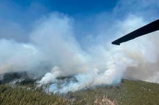 Wind-whipped fire forces more New Mexico residents to flee