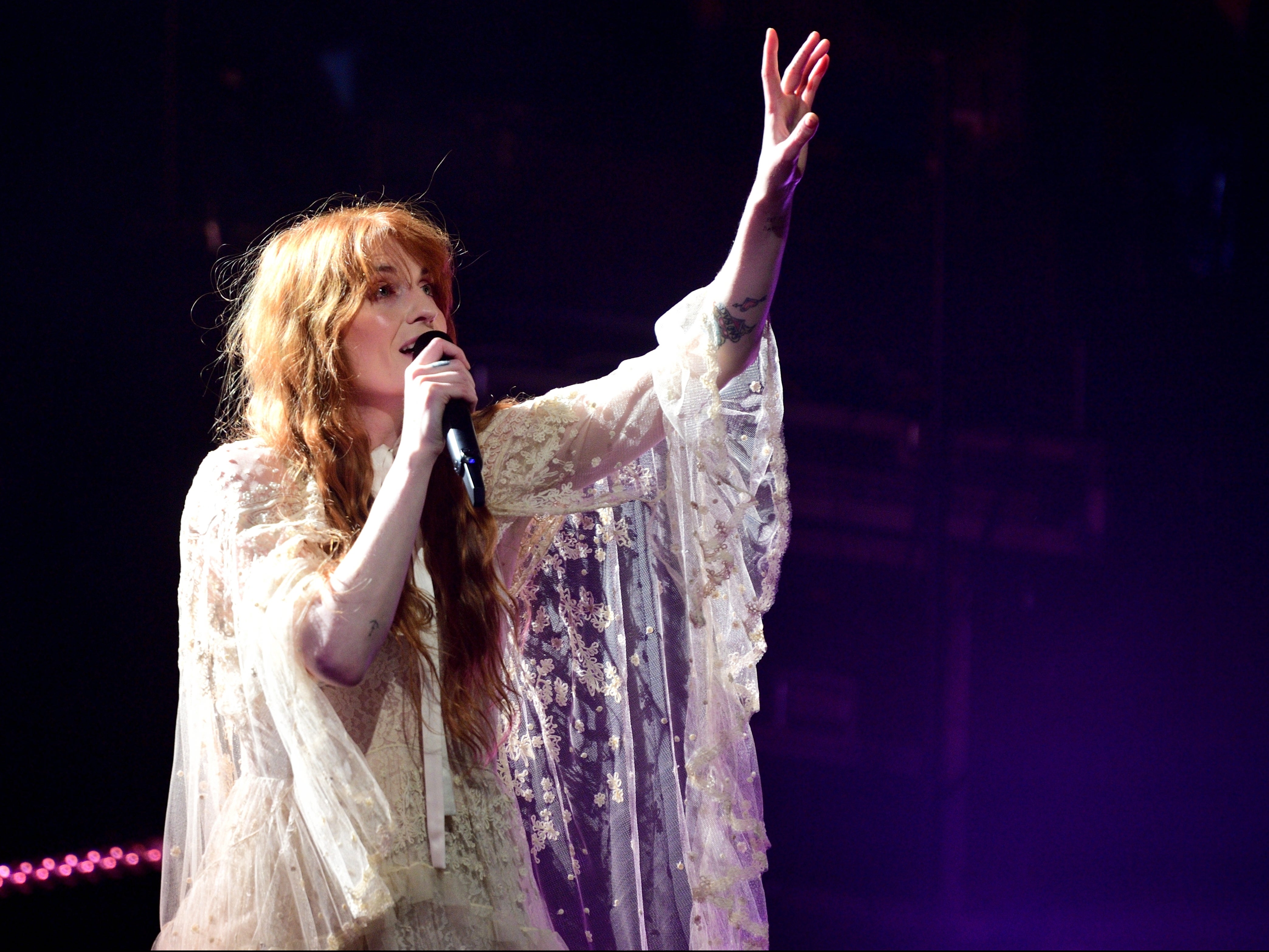 Florence Welch of Florence + the Machine performs on stage at Theatre Royal Drury Lane on 19 April, 2022 in London, England