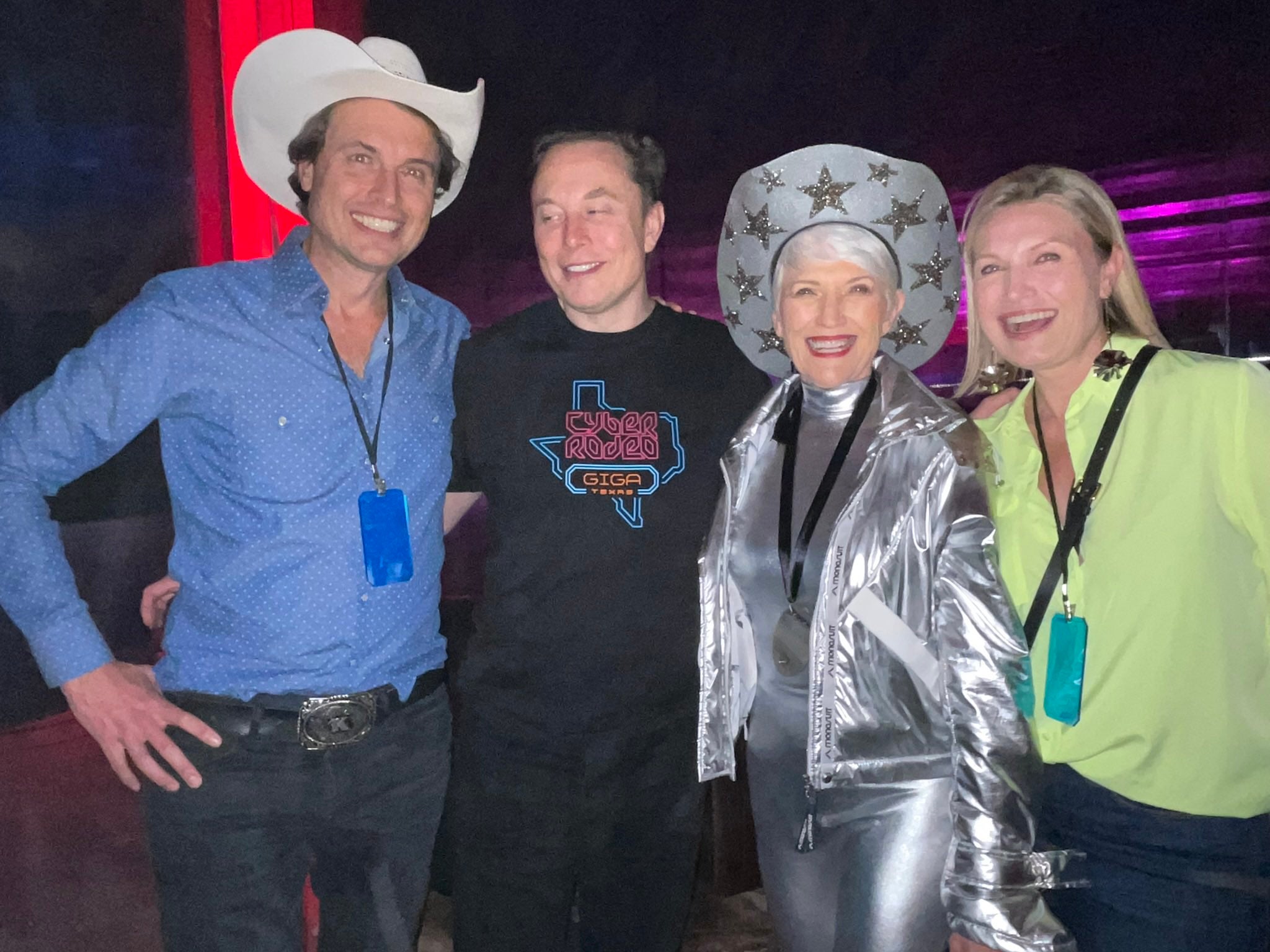 Elon and his siblings at an event with their mother