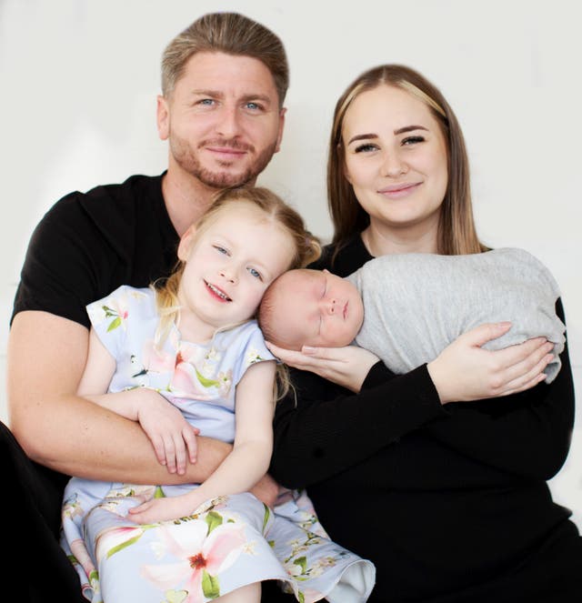 Sammy Gray and her family. Ms Gray underwent an innovative cancer treatment before being able to conceive her son Walter (Kelly Couttie Photography/PA)