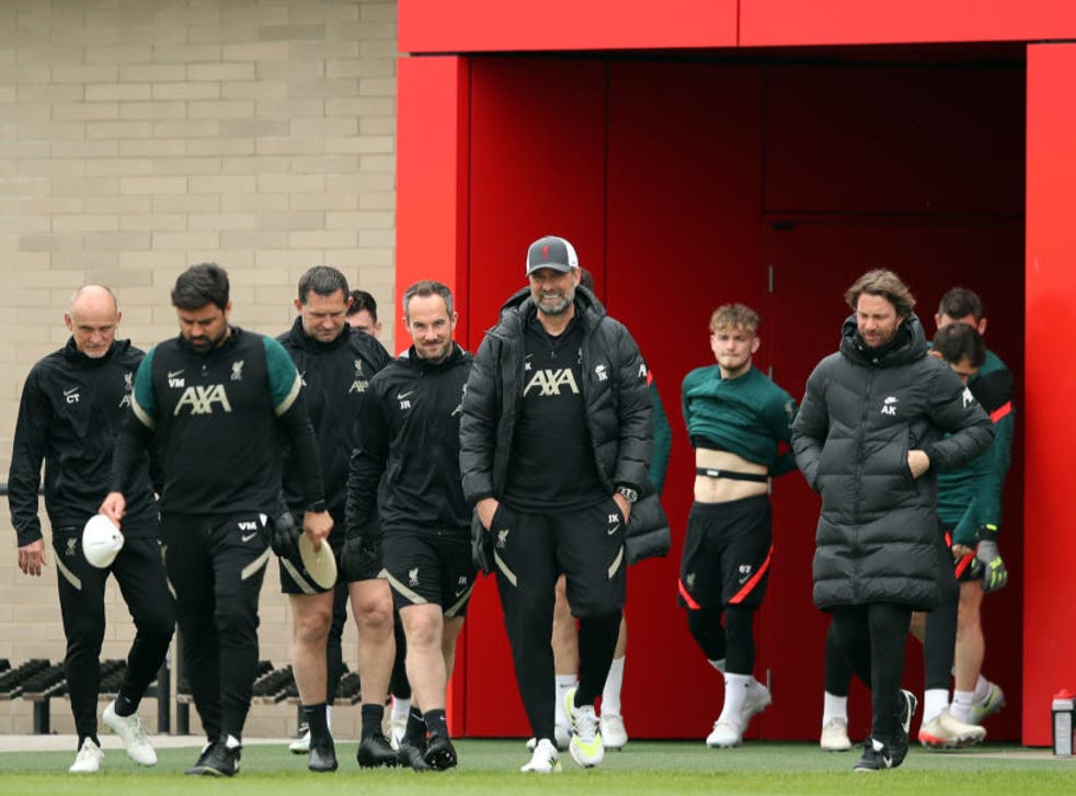 <p>Jurgen Klopp leads his squad out to training</p>