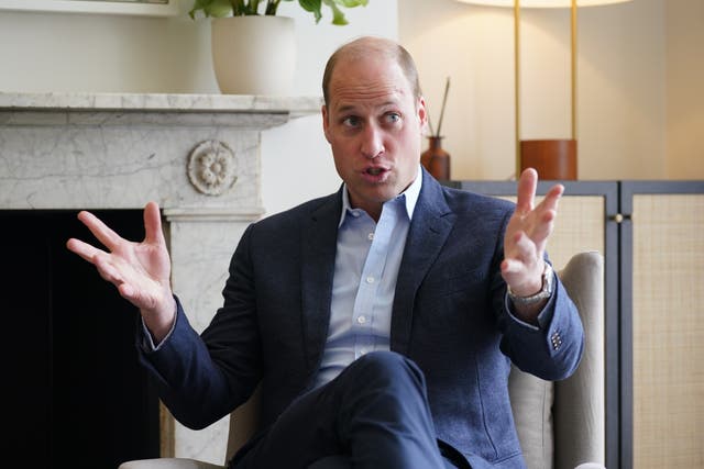 The Duke of Cambridge talking to staff during a visit to the new London centre of James’ Place (Yui Mok/PA)